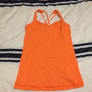 Bright orange Lululemon workout tank